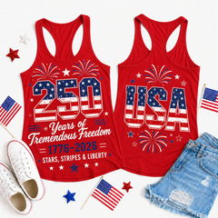Two red tank tops with 4th of July designs on a white background with accessories.
